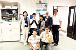 視察後に記念写真
