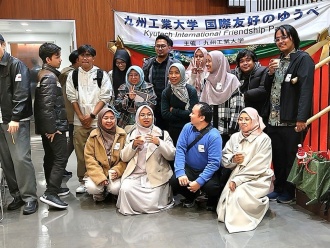 International students enjoying photo sessions at the photo booth.