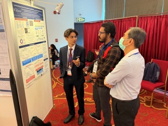 A scene from the poster presentation. Mr. Muhammad Syahmi Hazim Bin Mohd Nizar is on the far left. His poster attracted many visitors throughout the session.